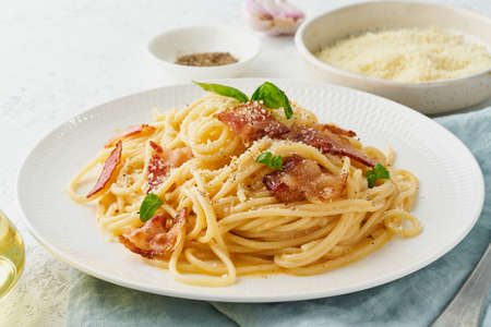 Carbonara pasta. Spaghetti with pancetta, egg, parmesan cheese and cream sauceの写真素材