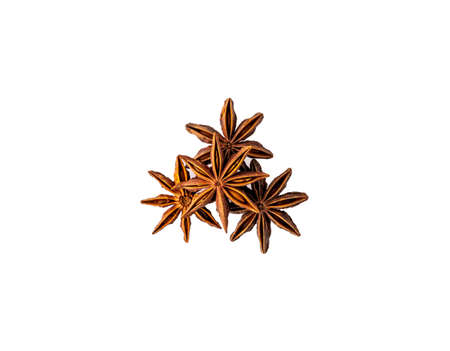Chinese star anise seed pile isolated over the white background high angle viewの写真素材