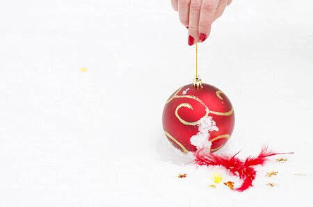 New Year's toy on snowの写真素材