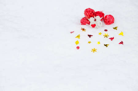 angels with heart on snowの写真素材