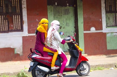 girls on transport in Muslim national clothesの写真素材