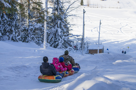 entertainment in the winter descent down about hillsの写真素材