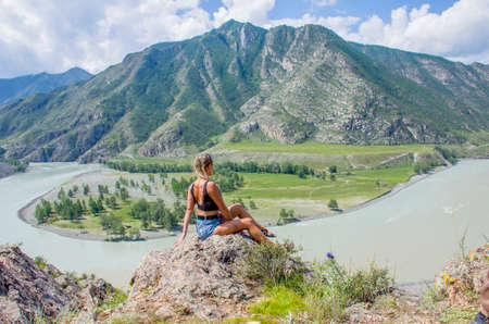 Landscape girl in Altai mountains in Russiaの写真素材