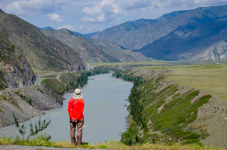 Landscape girl in Altai mountains in Russia