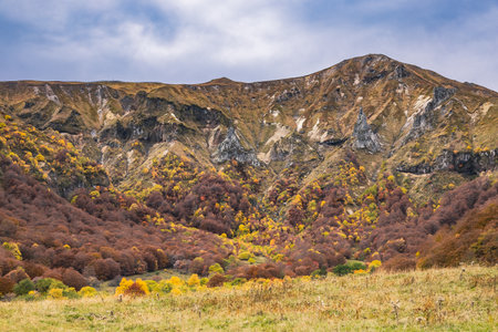 Autumn Mountain Landscape with Colorful Foliage and Rock Formationsの写真素材