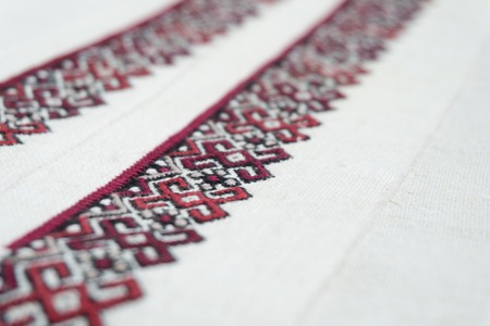 fragment of embroidery on the homespun clothの写真素材