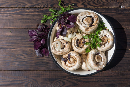 Preparation of pickled mushrooms with vegetables and spicesの写真素材