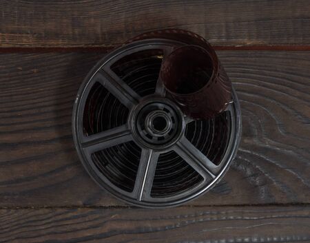 Equipment for film development on the dark wooden surface.の写真素材