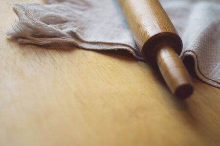 Rolling pin and towel the tableの写真素材