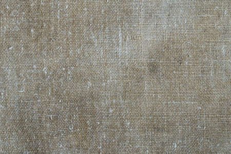 Background of an old rough burlapの写真素材