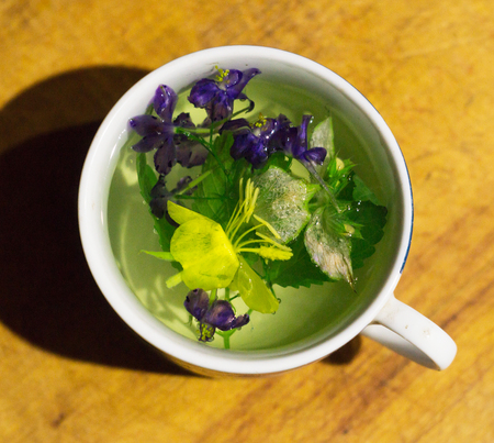 Tea from meadow grasses in a cupの写真素材