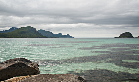 Rocky shore, turquoise water, Lofoten archipelago, Norway. National Tourist Route Lofotenの写真素材