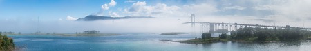 The Tjeldsund Bridge in the fog. The bridge connects the island Hinnoya with the mainland, Norwayの写真素材