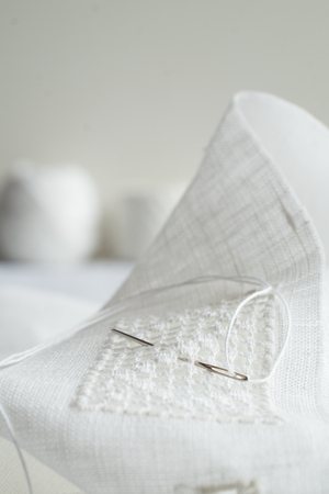 Fragment of hand embroidery by white hemstitchの写真素材