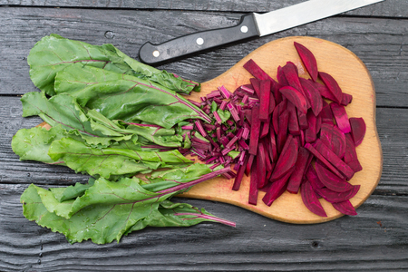 Sliced beet on a blackboardの写真素材