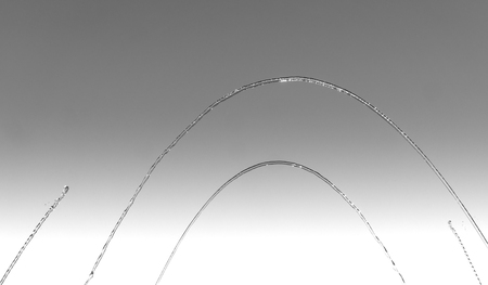 Streams and drops of water on a blue backgroundの写真素材