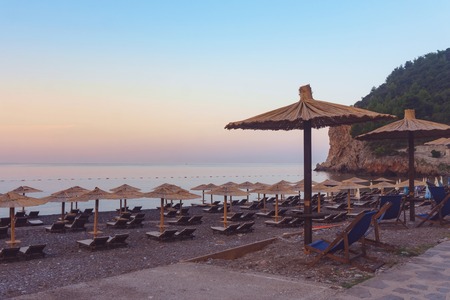 Cane parasols on the  Buljarica beach, Montenegroの写真素材