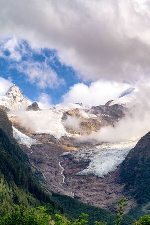Mont Blanc massif, Alps, France. Mountains and glaciers in the cloudsの写真素材