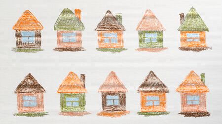 Child crayons drawing of many small houses on textured paperの写真素材