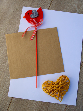 envelope and heart on the tableの写真素材