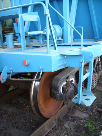 wheels on freight rails at a railway stationの写真素材