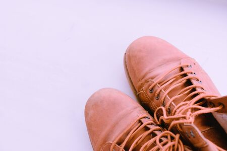a pair of men's brown shoes with lacing and grommets close-up. the view from the topの写真素材