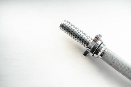 Dumbbell neck on a white background