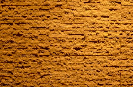pattern of modern dark brown or red  brick wall background texture vintage masonry or plaster on concrete or cement stucco architecture for interior built urban concept design building with copy spaceの写真素材
