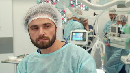Surgeon thinks about some problemの写真素材