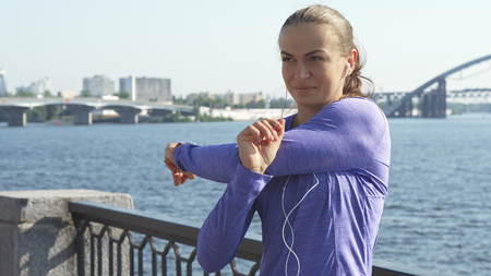 Woman switches her gaze, while stretching and warming up