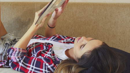 The girl is reading a book