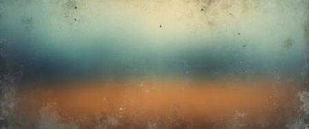 This ethereal image features a blurred landscape, blending soft blues and warm oranges, evoking a sense of tranquility and nostalgia. The textured background adds depth, creating a serene atmosphere perfect for artistic projects or calming designs.の素材