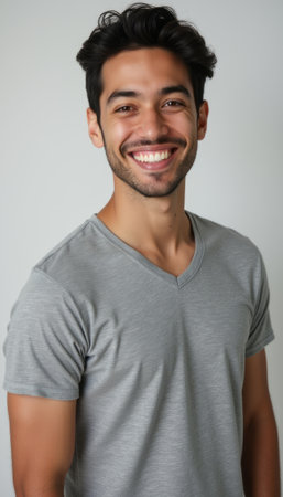 Cheerful young man with a radiant smileの素材