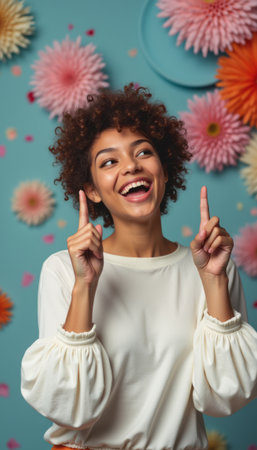 Joyful woman celebrating with playful gesturesの素材