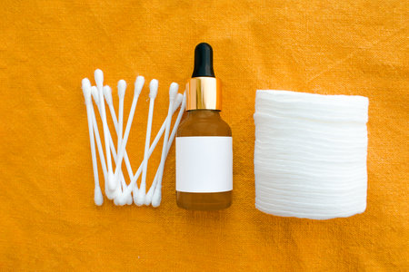 cosmetic dark amber glass bottles. closeup, copyspace. Beauty blogging, salon treatment concept, minimalism brand packaging mock up. mockap. high quality photoの写真素材