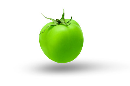 Green tomatoes on white background. High quality photoの写真素材