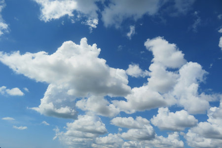 Beautiful fluffy clouds in the sky, natural backgroundの写真素材