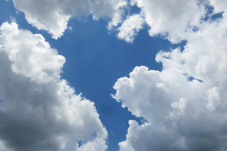 Clouds in the blue sky as a symbol of hope and peaceの写真素材