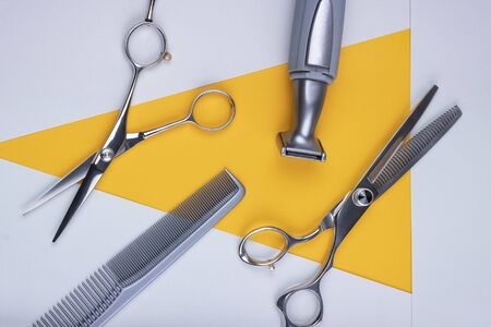 Set of hairdressing tools scissors, comb and shaving machine. Flat layt.の写真素材