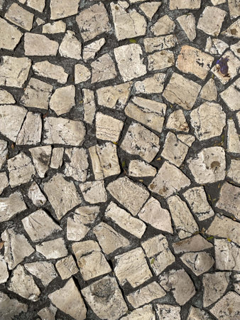 White paving stones on the roads of Portugal, top view