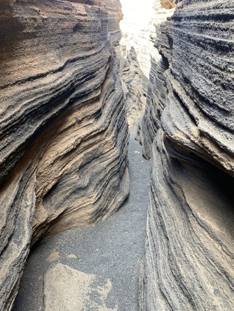 Grito del volcanic is a volcanic crack where you can walk. It is a narrow winding passage in the frozen lava. The award will be fantastically beautiful photos with "Martian views".の写真素材