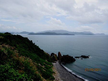 Beach, sea, mountainsの写真素材