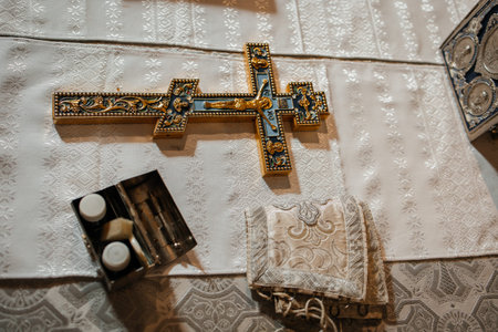 Interior of a church with a cross, candles and a towel