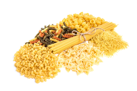 Mix of pasta isolated on white background.の写真素材