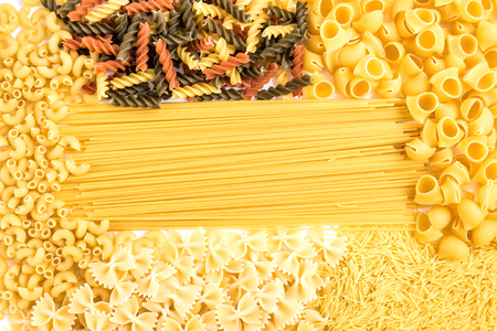 Mix of pasta isolated on white background.の写真素材