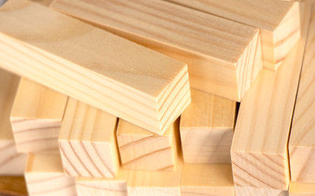 small wooden blocks stacked on. Wood texture, background. Jenga wooden planksの写真素材