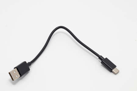 usb cord isolated on white background. wire charger. Place for textの写真素材