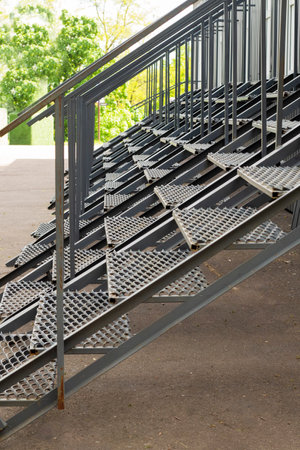 external staircase: row of external metal steps, detail of electro-welded meshの写真素材
