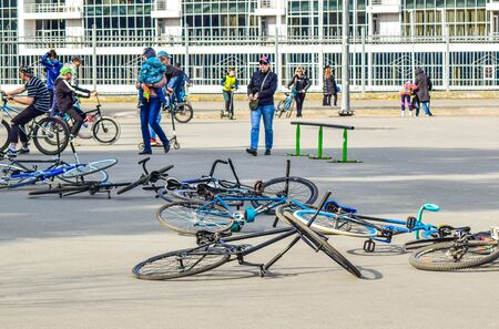 Chelyabinsk city, Russia. Gagarin park, April 27, 2019. Group of cyclists relaxing in the park....
