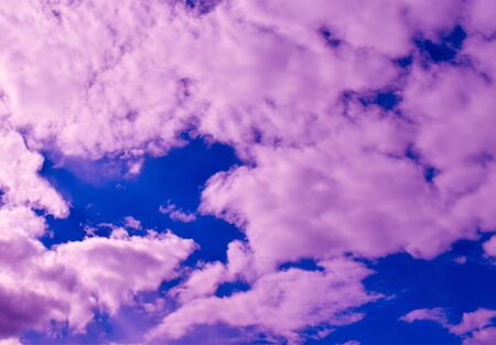 Most beautiful landscape of pink clouds on a blue sky. Best natural clouds. Pink sunset.の写真素材